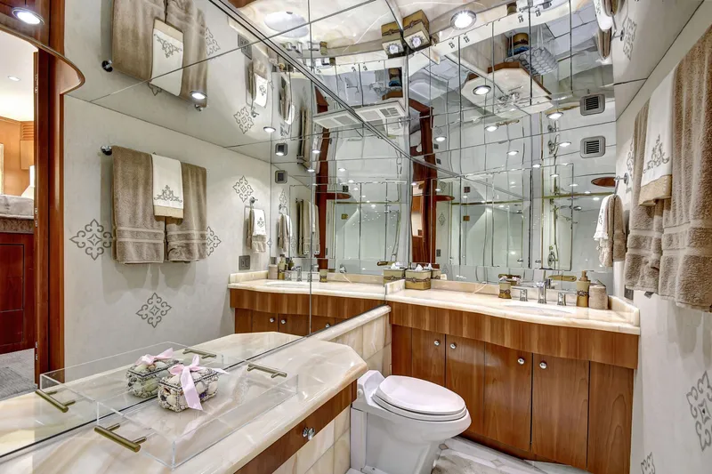 Slide: The Image of Luxurious bathroom in 2005 Hatteras Semi-Displacement yacht with elegant fixtures and mirrored walls. - 30