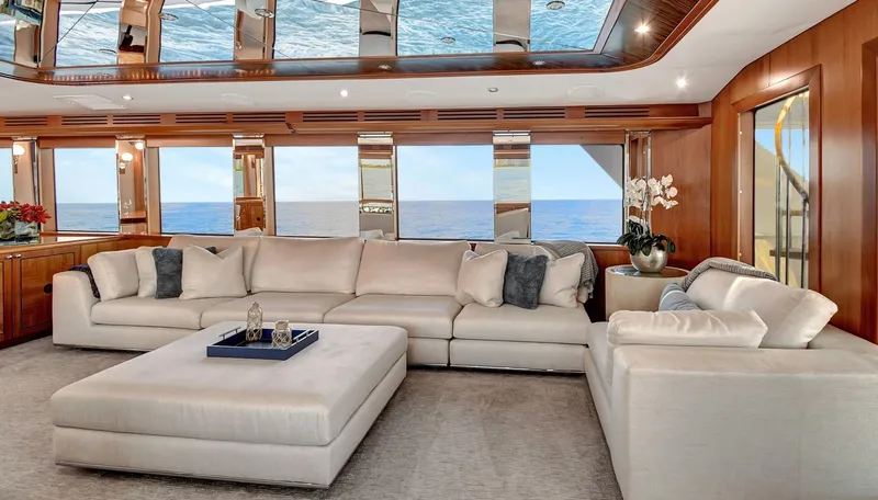 Slide: The Image of Luxurious interior of 2005 Hatteras Semi-Displacement yacht with elegant seating and ocean view. - 5