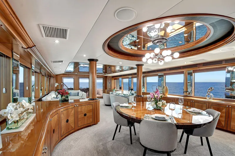 Slide: The Image of Main Deck Salon & Dining Area - Danielle 100' Hatteras 2005/2024 - 7