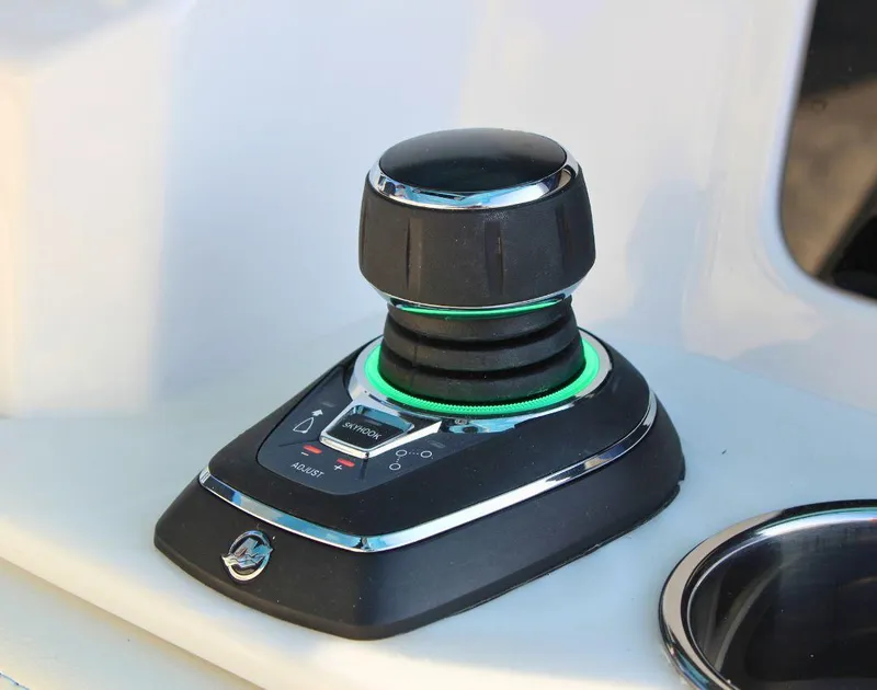 Slide: The Image of Joystick control on 2025 Fountain 38 SCX boat dashboard. - 17