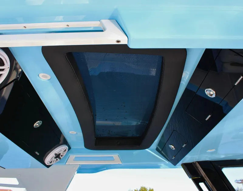 Slide: The Image of Interior view of 2025 Fountain 38 SCX boat, featuring sleek design and modern amenities. - 19