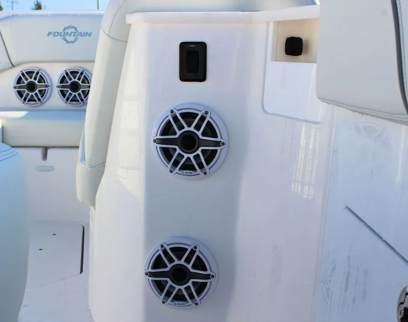 Slide: The Image of 2025 Fountain 38 SCX boat interior with speakers and seating. - 21