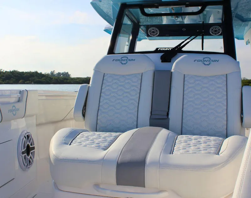 Slide: The Image of 2025 Fountain 38 SCX boat interior with luxurious seating and modern design. - 27