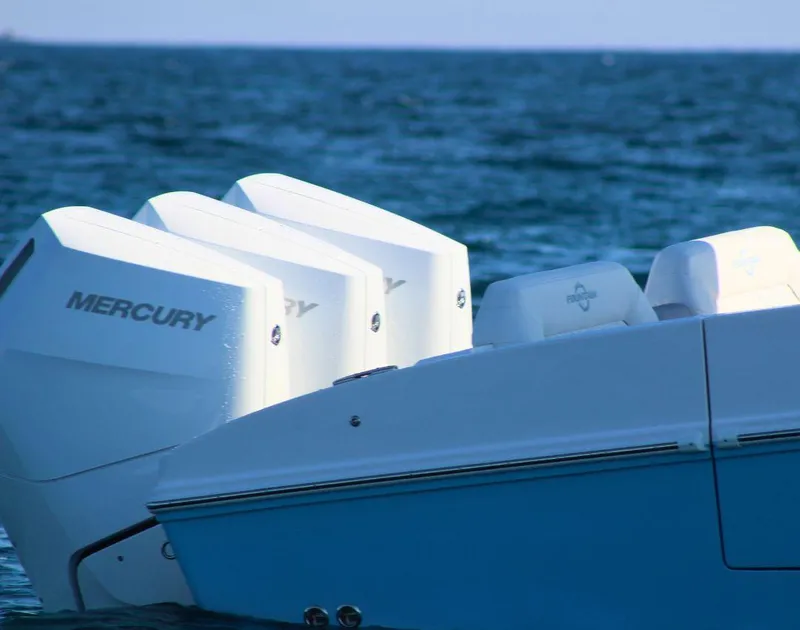 Slide: The Image of 2025 Fountain 38 SCX boat with Mercury engines on the ocean. - 6