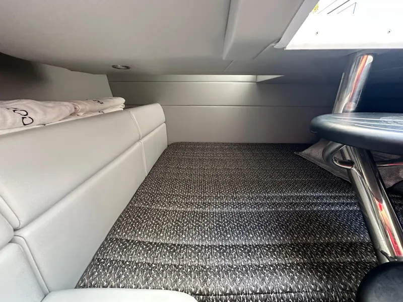 Slide: The Image of 2020 Formula 350 Crossover Bowrider OB cabin interior with cushioned seating and modern design. - 24