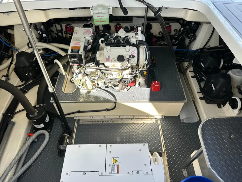Slide: The Image of Engine compartment of a 2020 Formula 350 Crossover Bowrider OB boat. - 31