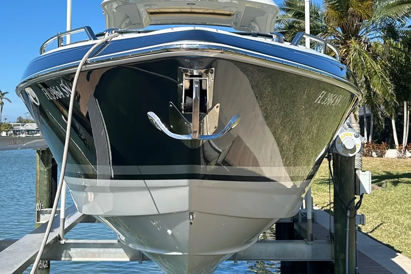 Slide: The Image of 2020 Formula 350 Crossover Bowrider OB on lift, front view, sunny day. - 5