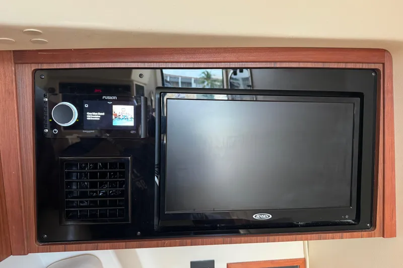 Slide: The Image of 2024 Grady-White Freedom 335 boat interior with spacious seating and modern design. - 20