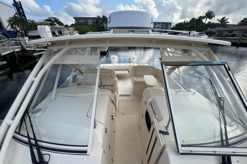 Slide: The Image of Control panel of 2024 Grady-White Freedom 335 boat, displaying engine, exhaust, and oil pressure indicators. - 30