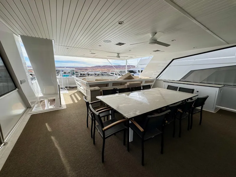 Slide: The Image of Luxurious yacht deck with dining area, Adonia Cosmos Trip #11, 2024 model. - 31