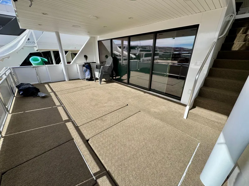 Slide: The Image of Spacious deck area on Adonia Cosmos Trip #11 yacht, 2024 model. - 4