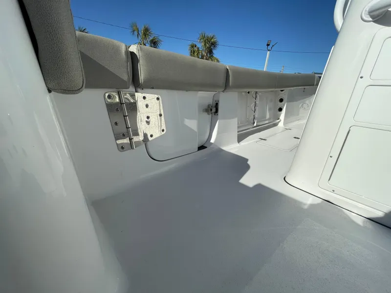 Slide: The Image of 2021 Sportsman Open 282 Center Console interior with cushioned seating and sleek design. - 7