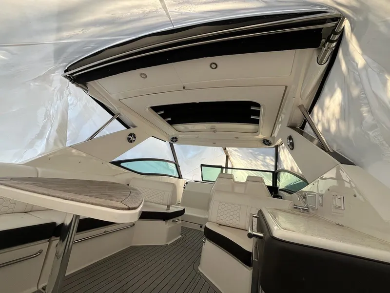 Slide: The Image of 2020 Sea Ray Sundancer 320 interior with sleek seating and modern design. - 4