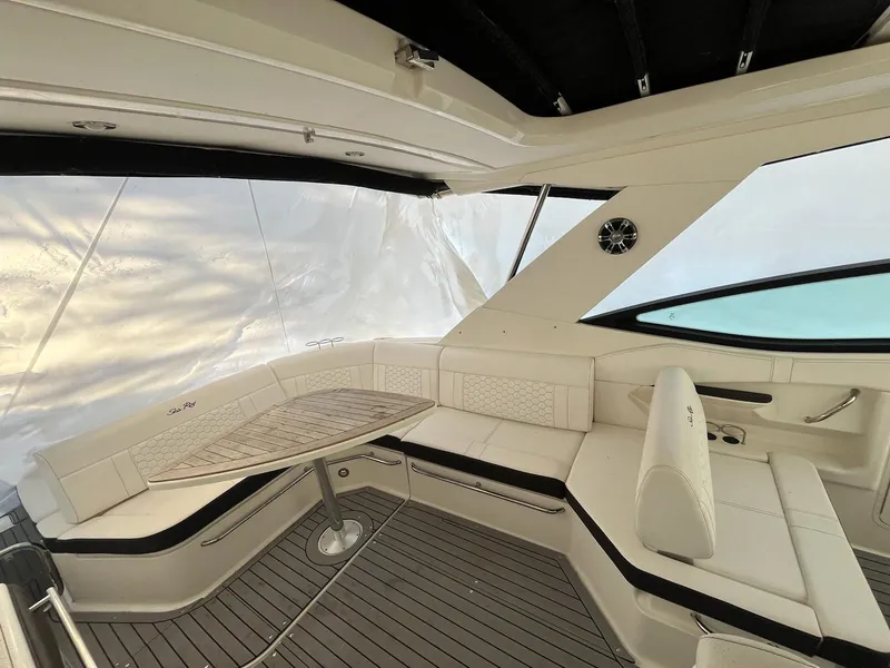 Slide: The Image of 2020 Sea Ray Sundancer 320 interior with elegant seating and sleek design. - 5