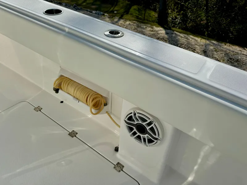 Slide: The Image of Invincible 37 Catamaran 2020 deck detail with speaker and coiled rope. - 27