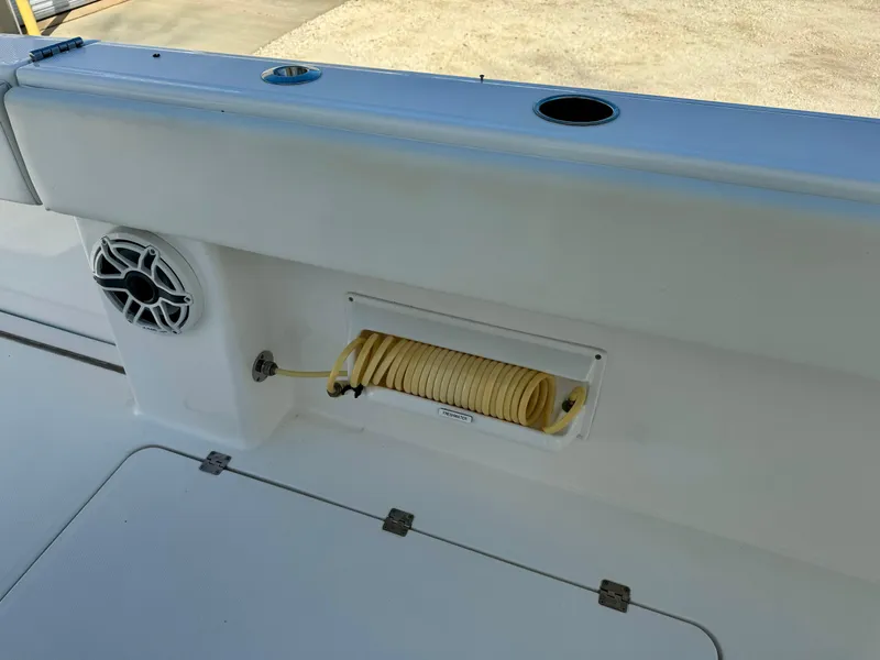 Slide: The Image of Invincible 37 Catamaran 2020 deck with hose storage and speaker. - 28