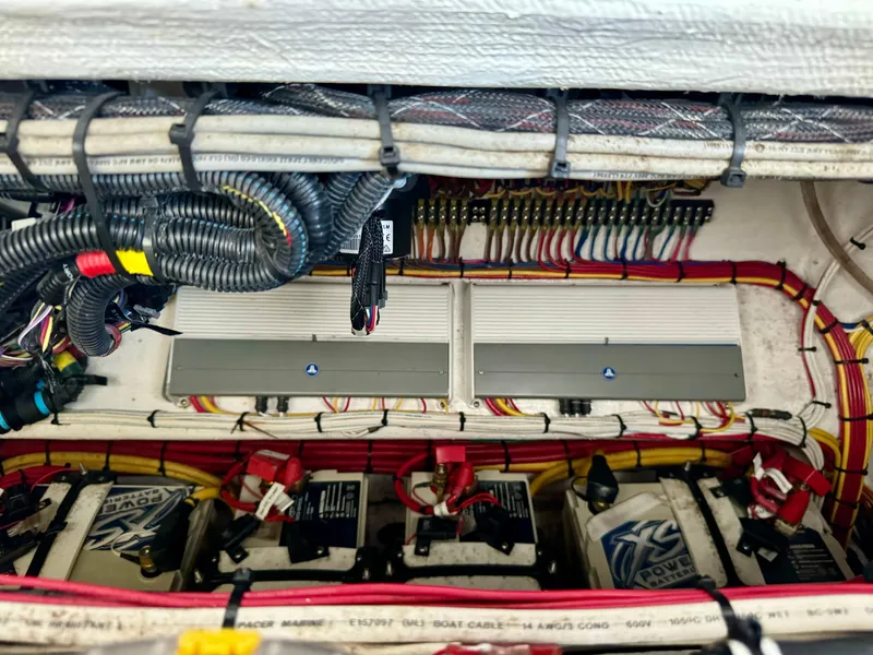 Slide: The Image of Electrical wiring and components inside a 2020 Invincible 37 Catamaran. - 31