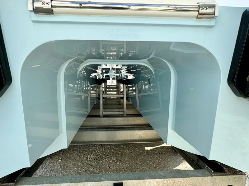 Slide: The Image of 2020 Invincible 37 Catamaran hull view, showcasing sleek design and craftsmanship. - 6