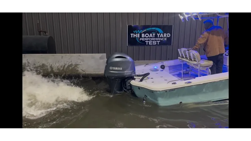 Slide: The Image of 2019 Sea Chaser 23 LX boat undergoing performance test with Yamaha engine. - 12