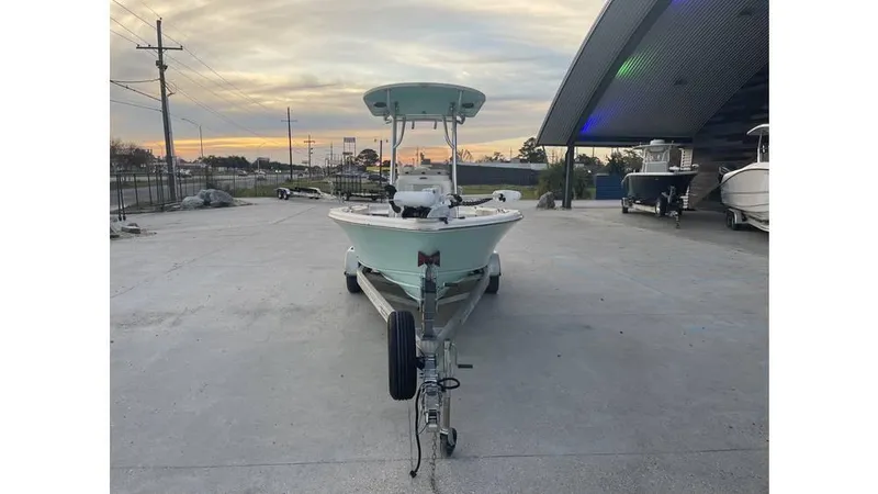 Slide: The Image of 2019 Sea Chaser 23 LX boat on trailer at sunset, parked outdoors. - 3