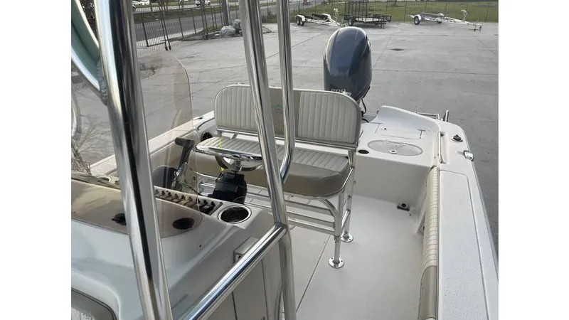 Slide: The Image of 2019 Sea Chaser 23 LX boat interior with seating and controls. - 7