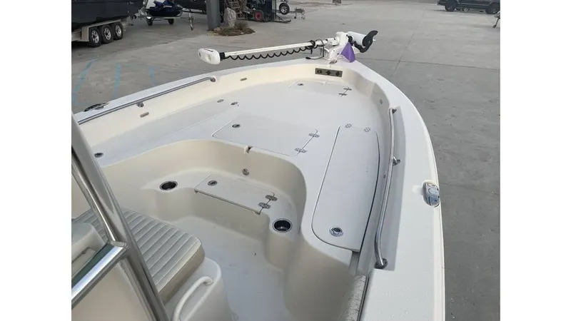 Slide: The Image of 2019 Sea Chaser 23 LX boat deck with seating and storage compartments. - 9
