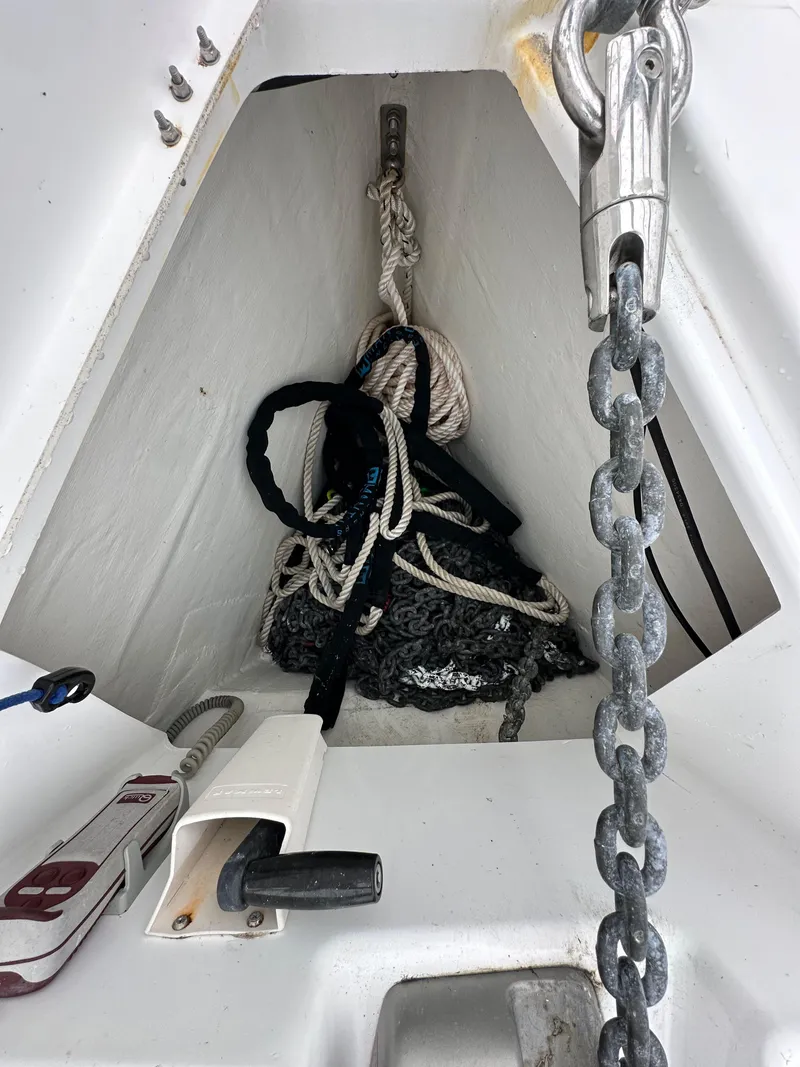 Slide: The Image of Anchor locker of 2015 Jeanneau 41DS sailboat with ropes and chain. - 17