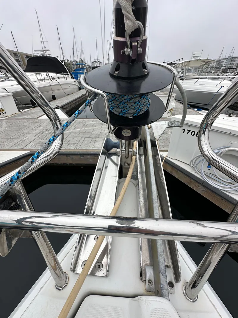Slide: The Image of Jeanneau 41DS 2015 sailboat bow with winch and ropes at marina. - 18