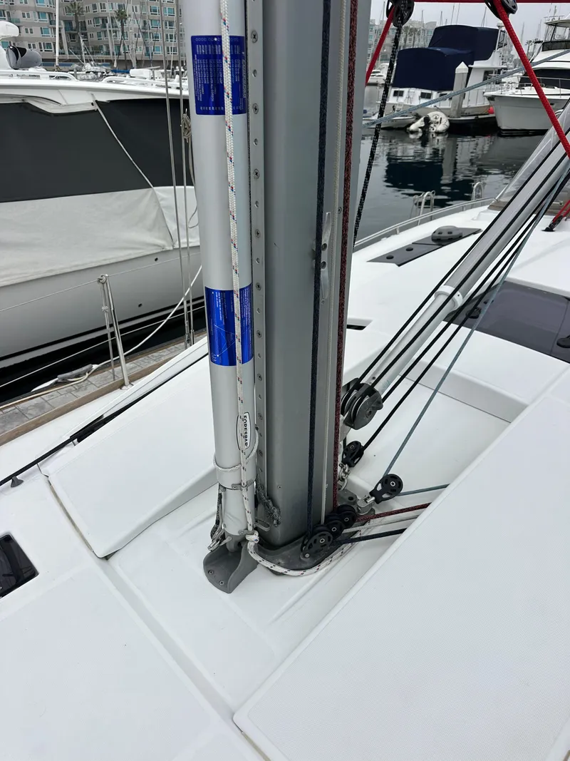 Slide: The Image of 2015 Jeanneau 41DS sailboat mast and rigging at marina. - 22