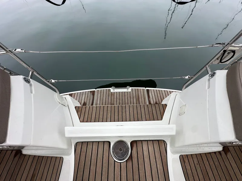 Slide: The Image of Jeanneau 41DS 2015 yacht deck with wooden flooring and water view. - 33