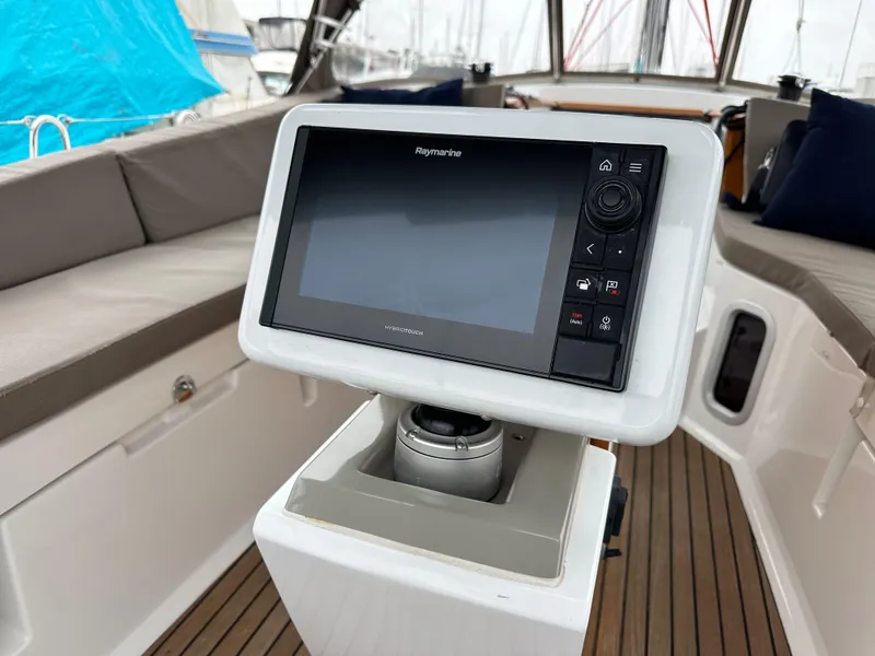 Slide: The Image of Jeanneau 41DS 2015 sailboat cockpit with Raymarine navigation display. - 42