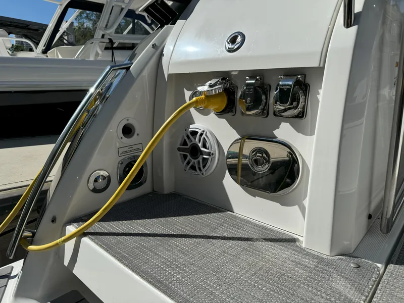 Slide: The Image of Outdoor grill on 2022 Formula 380 Super Sport Crossover OB boat deck. - 11