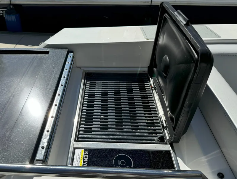 Slide: The Image of 2022 Formula 380 Super Sport Crossover OB boat with radar and satellite equipment. - 12