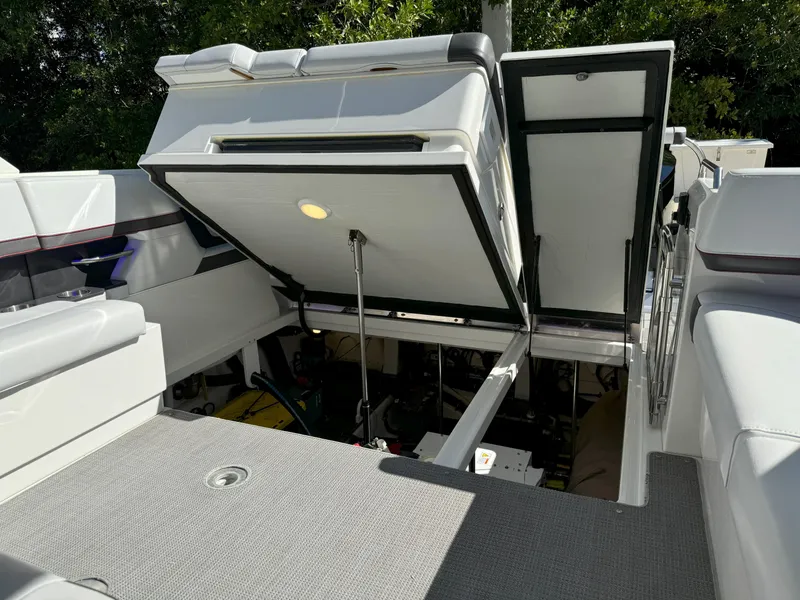 Slide: The Image of Engine compartment of 2022 Formula 380 Super Sport Crossover OB with visible components and wiring. - 14