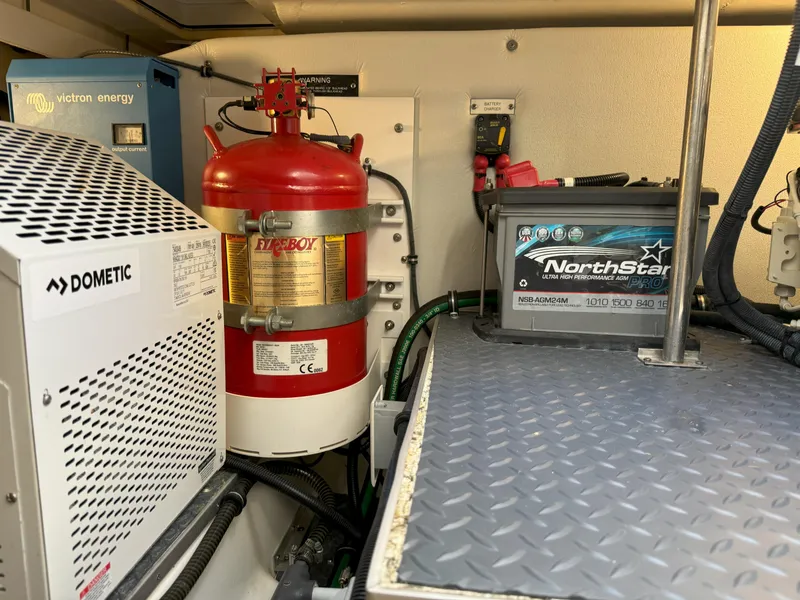 Slide: The Image of Engine compartment of 2022 Formula 380 Super Sport Crossover OB boat. - 17