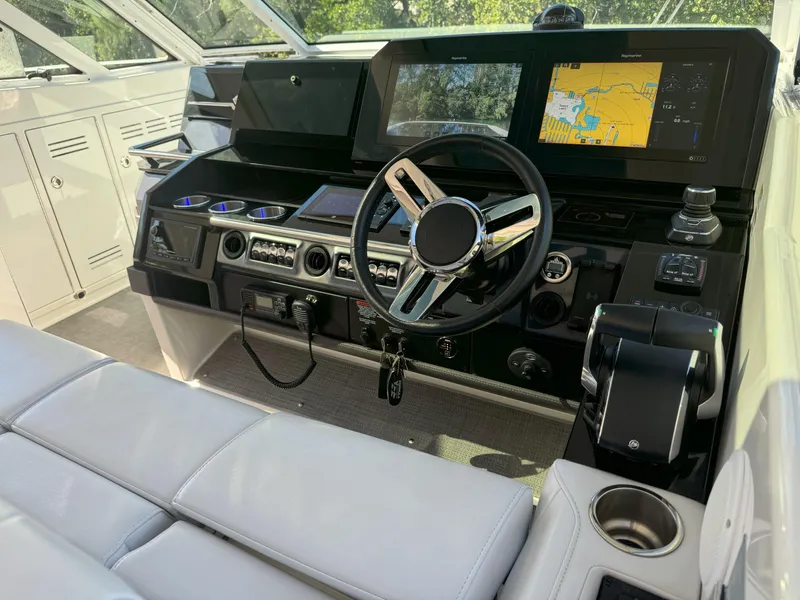 Slide: The Image of 2022 Formula 380 Super Sport Crossover OB helm with advanced navigation system. - 20