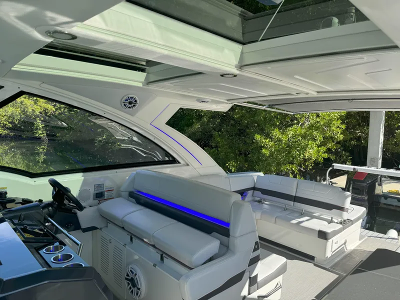 Slide: The Image of 2022 Formula 380 Super Sport Crossover OB interior with white seating and modern design. - 25