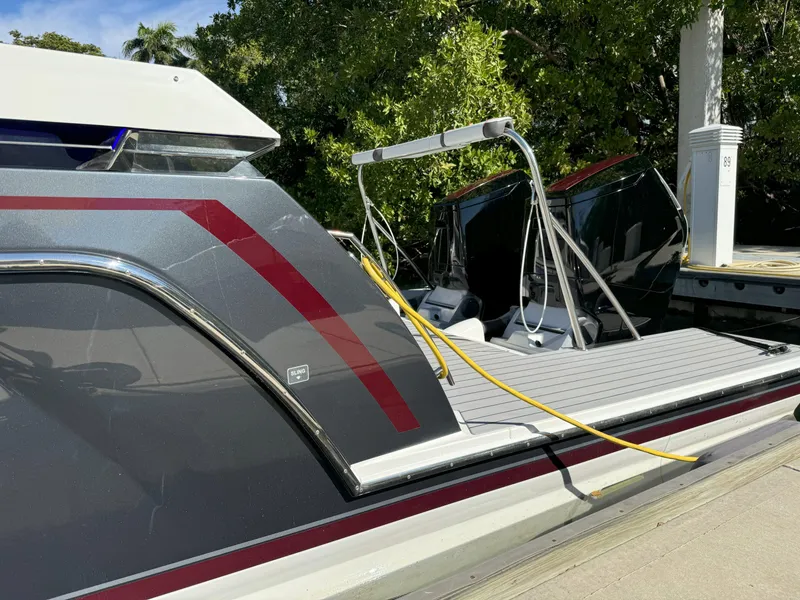 Slide: The Image of 2022 Formula 380 Super Sport Crossover OB boat storage compartment with open lids. - 29