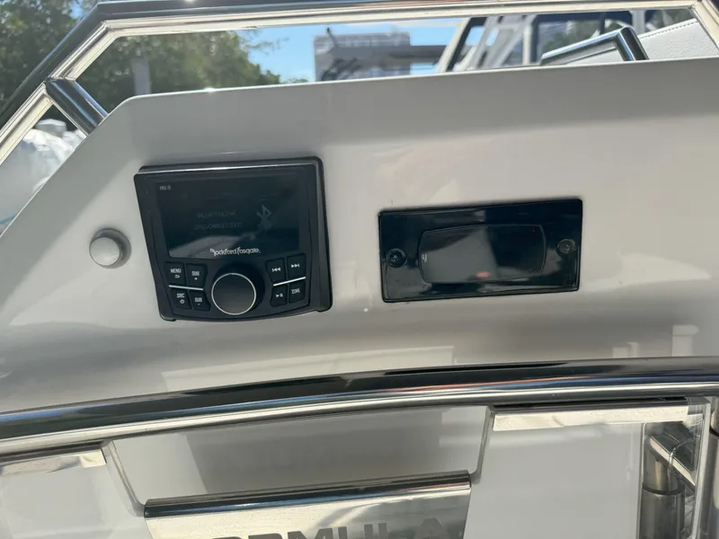 Slide: The Image of 2022 Formula 380 Super Sport Crossover OB interior with sleek design and cup holders. - 33