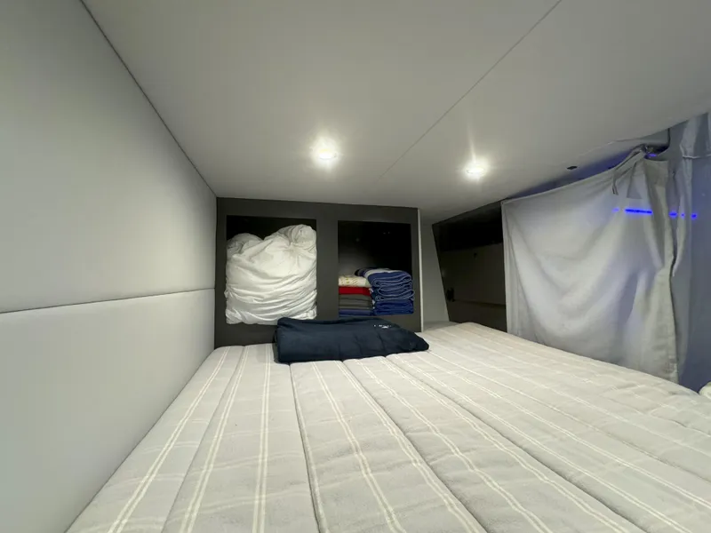 Slide: The Image of 2022 Formula 380 Super Sport Crossover OB cabin with cozy bed and modern design. - 35