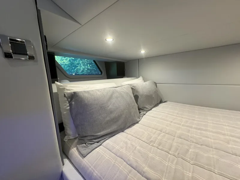 Slide: The Image of 2022 Formula 380 Super Sport Crossover OB bathroom interior with modern fixtures and window. - 36