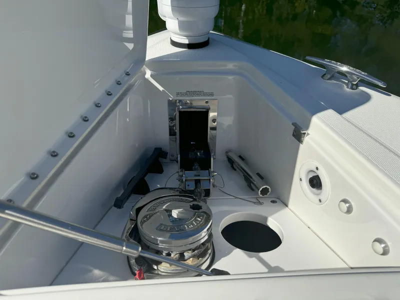 Slide: The Image of 2022 Formula 380 Super Sport Crossover OB boat with sleek design and spacious seating. - 48