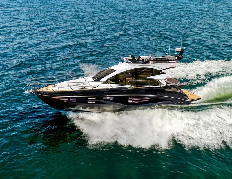 The Image of 2025 Cobrey 45 FLY yacht cruising on open water, showcasing sleek design and luxury. - 0
