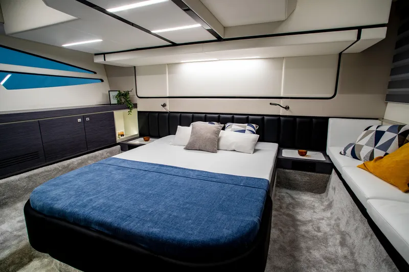 Slide: The Image of Luxurious interior of 2025 Cobrey 45 FLY yacht with modern bedroom design. - 6