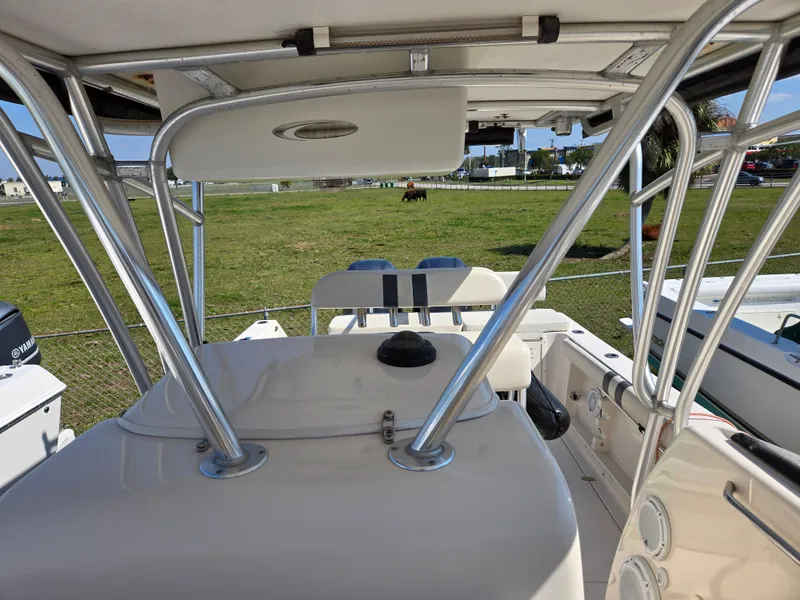Slide: The Image of 2008 Cobia 316 Sport Cabin boat interior with metal framework and seating. - 17