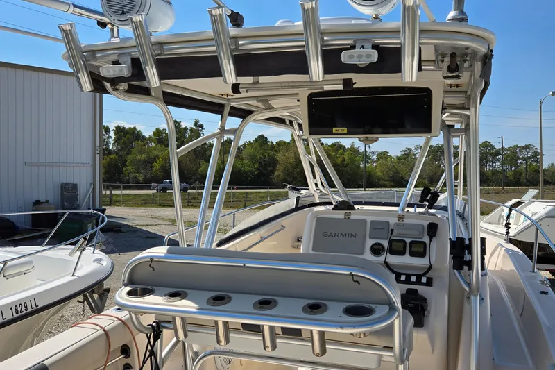 Slide: The Image of 2008 Cobia 316 Sport Cabin boat interior with Garmin navigation system. - 7
