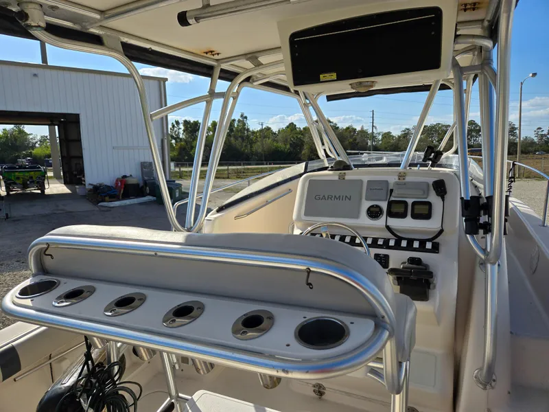 Slide: The Image of 2008 Cobia 316 Sport Cabin boat interior with Garmin navigation system. - 9