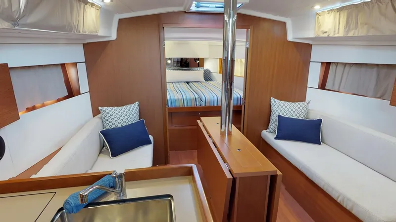 Slide: The Image of Interior of 2019 Beneteau Oceanis 38.1 yacht with cozy seating and modern design. - 21