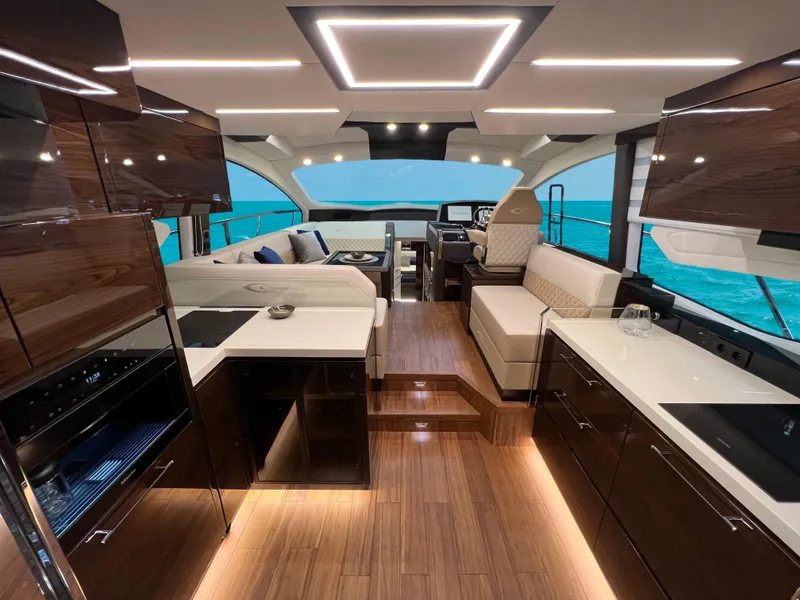 Slide: The Image of Luxurious interior of 2025 Cobrey 52 FLY yacht with modern design and elegant furnishings. - 10