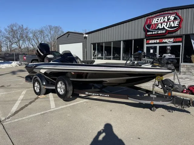 Slide: The Image of 2012 Ranger Z518 boat on trailer at Weda's Marine dealership. - 8
